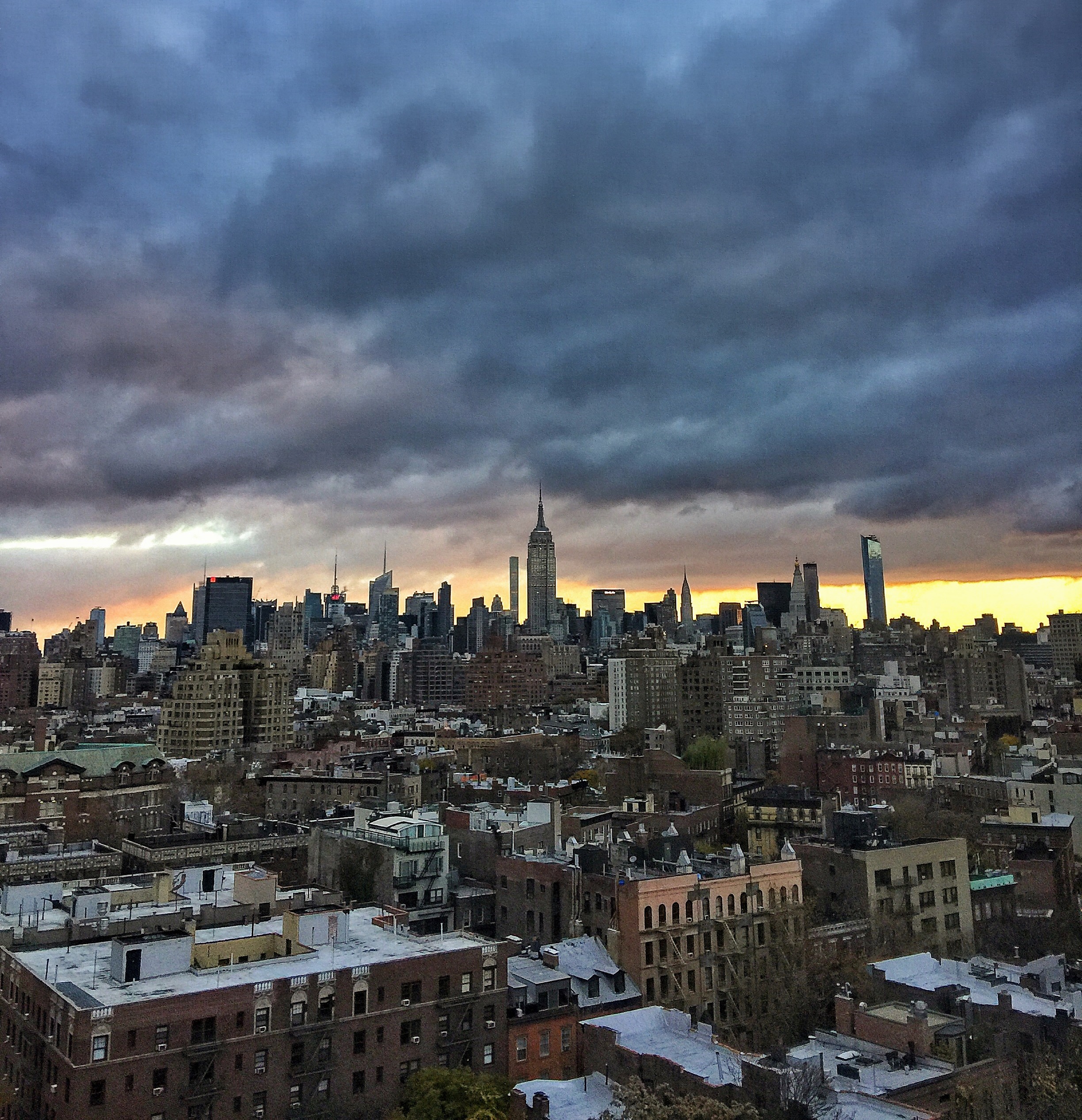 empire state building morning clouds vin farrell new york city instagram photgraphy